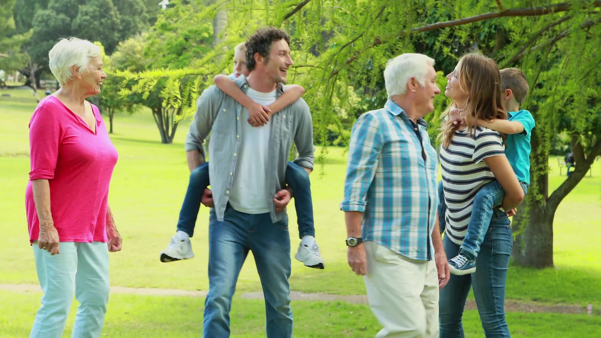 A multi-generational family enjoying time together outdoors